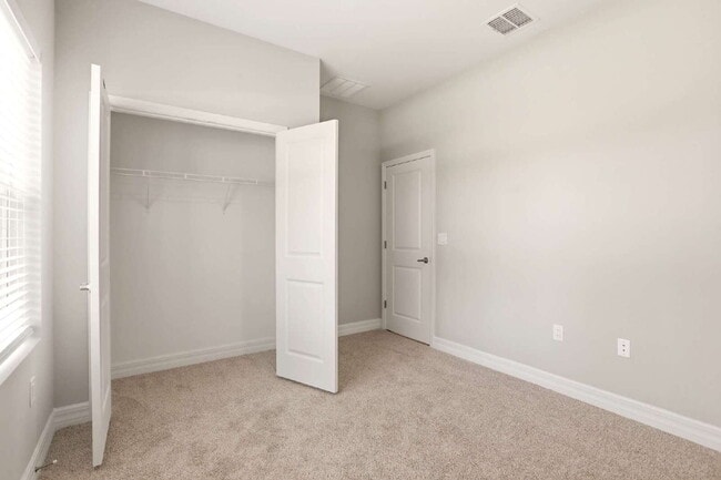 Building Photo - Brand New 4-Bedroom Gem with 2 Full Baths on Large Lot in Lehigh Acres – A Perfect Family Haven!