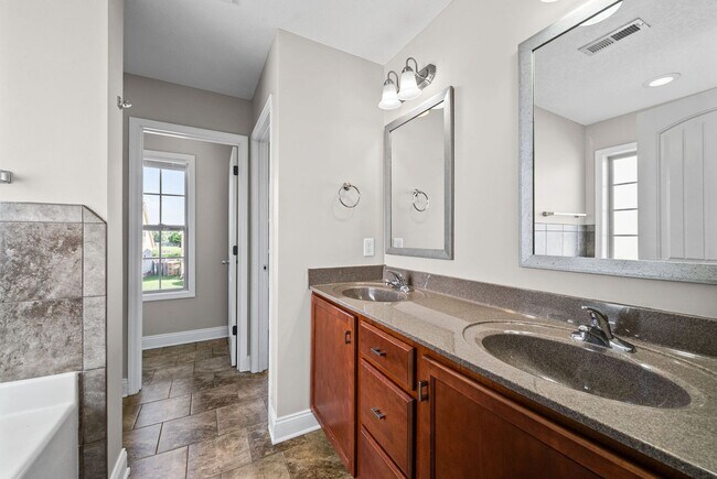 Building Photo - Pet Friendly Four Bedroom with Basement!