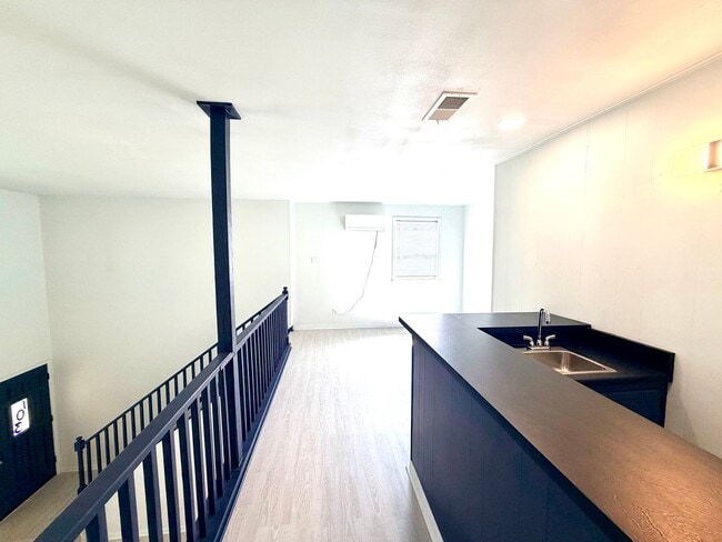 Building Photo - Stylish Two-Story Duplex with Loft, Fireplace & Private Backyard in New Braunfels!