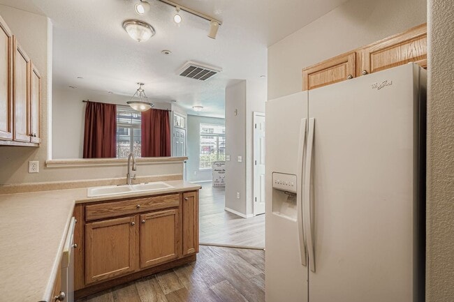 Building Photo - Move in Ready- Ground floor condo in covered Lodge at Terralago. Swimming Pool- Hot Tub and Fitne...