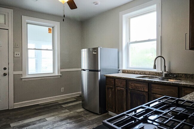 Building Photo - 6633 S Campbell Ave