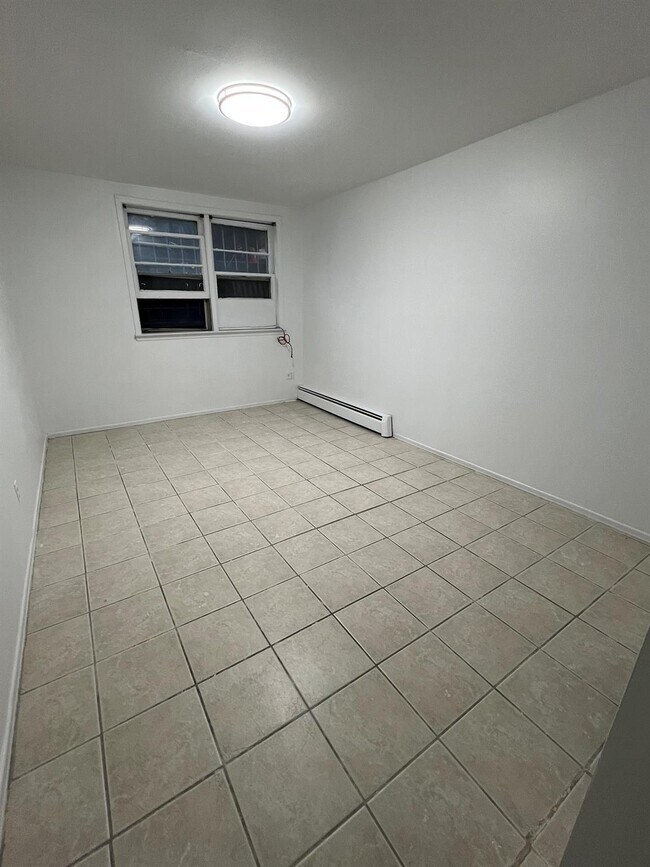 Building Photo - 240- 10 68th Ave