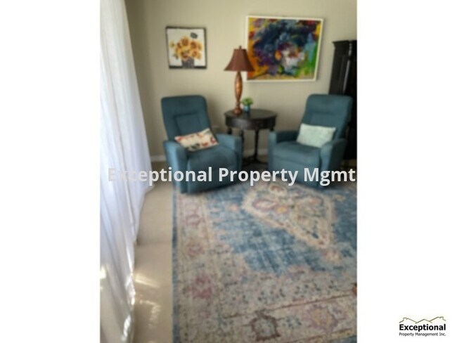 Building Photo - Beautiful Partially furnished annual renta...