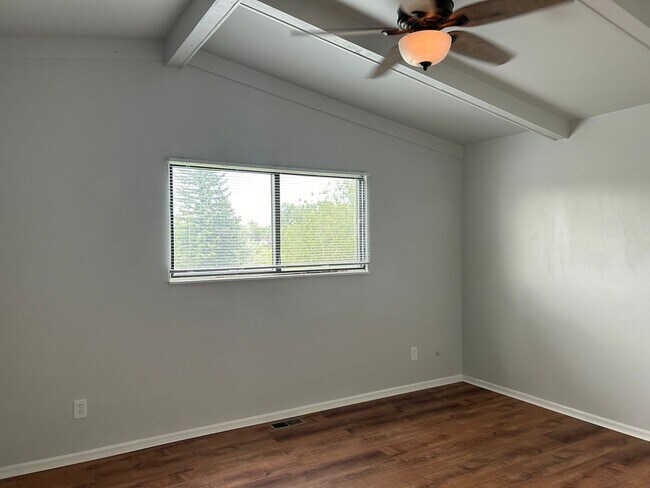 Building Photo - Spacious Fort Collins Rental with Hardwood Floors & Flex Space