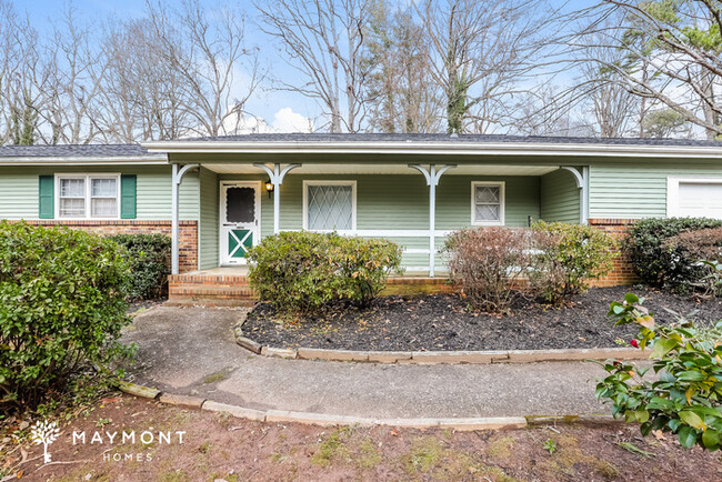 Building Photo - Inviting 4 Bedroom Home