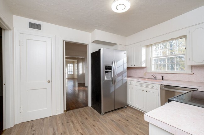 Building Photo - Park Hill Home with Original Details and Updated Kitchen
