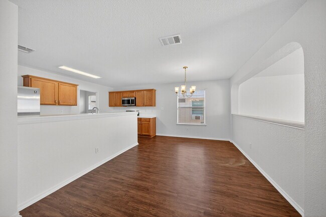 Building Photo - 4935 Dahlia Terrace