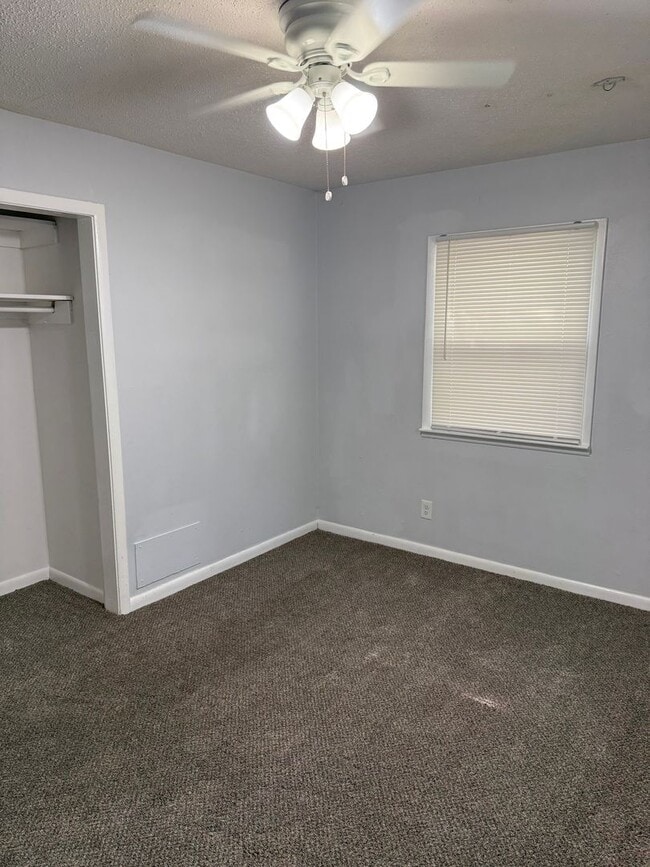 Building Photo - 3BR/1BA with overside detached garage read...