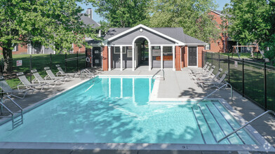 Relaxing Pool Area - Hunters Point Apartments