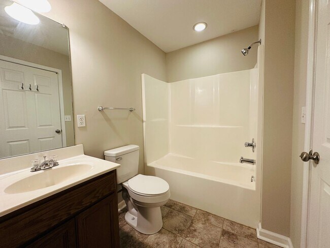 Building Photo - 2 bed, 2.5 bath updated townhouse w/ 1-car garage & Trex deck available now