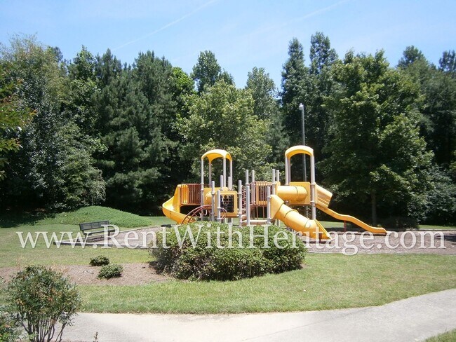 Building Photo - WOW!!...GORGEOUS HOME/HARDWOOD FLOORS/ UPGRADES GALLORE / SWIM - TENNIS