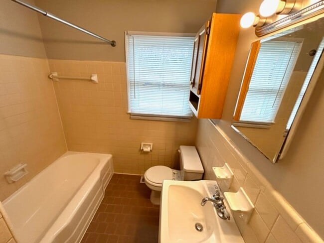 Building Photo - THREE BEDROOM ONE AND HALF BATH BRICK RANCH HOME