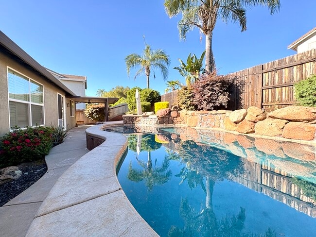 Building Photo - Beautiful 4 Bedroom with a large Pool! Located in Roseville close to a park!