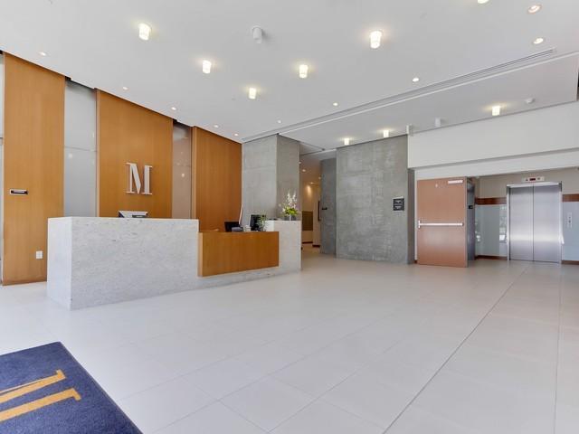 Building Photo - Gorgeous Downtown Condo with Spacious Floo...