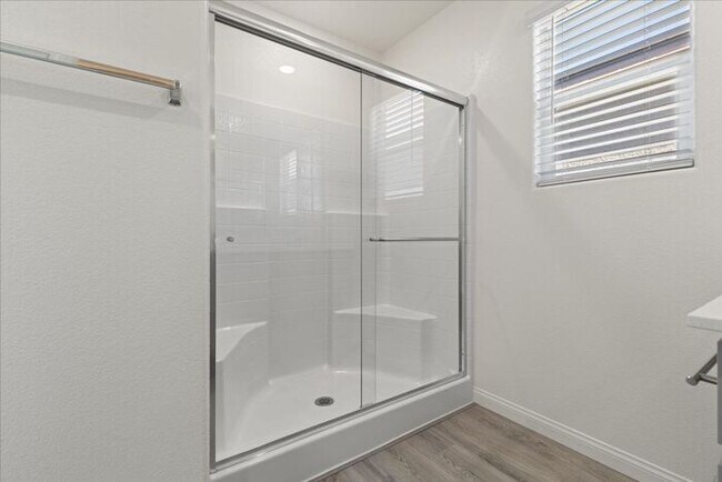 Building Photo - Modern 4-Bedroom Home with Turf Backyard in Gated Community
