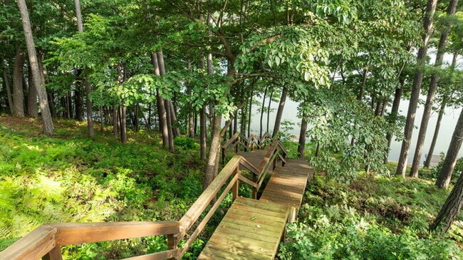 Building Photo - Serene Bella Vista Lakeside 4 bedroom