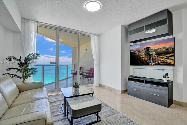 Building Photo - 16699 Collins Ave