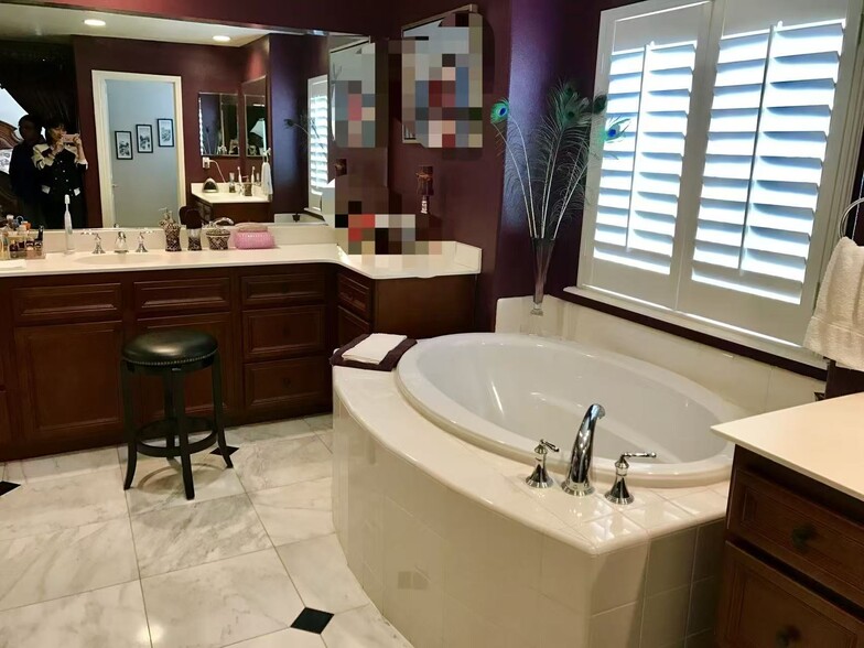 main bathroom with 2 walk in closet - 14575 Baylor Ave