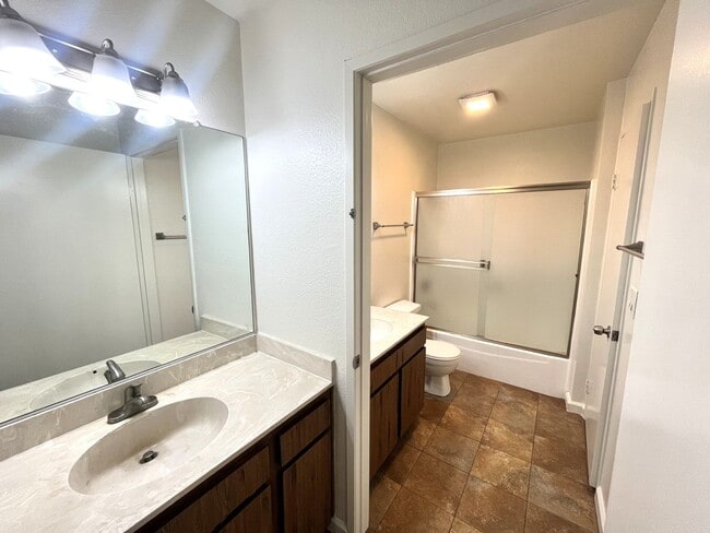 Building Photo - Mission Valley- Centrally Located Condo with AC, Private Patio and Parking.