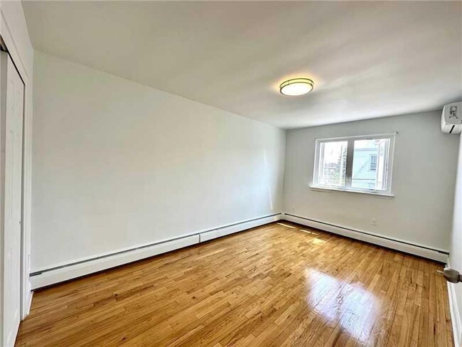 Building Photo - 66-61 73rd Pl