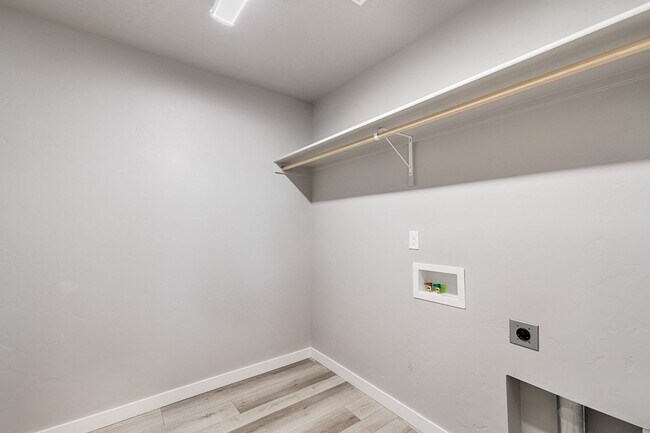 Building Photo - Custom Hunter-Douglas shutters throughout.