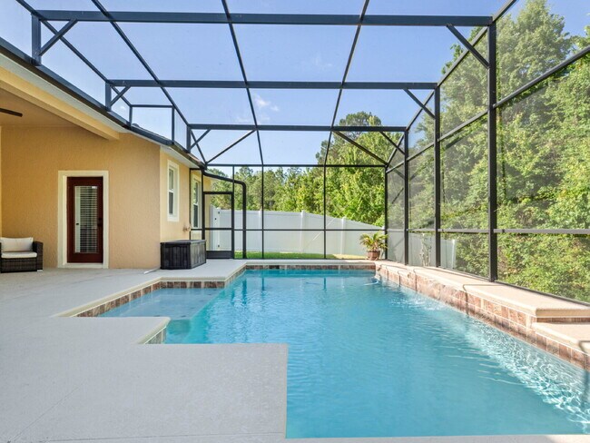 Building Photo - Spacious 4-Bedroom Pool Home with 3 Full B...