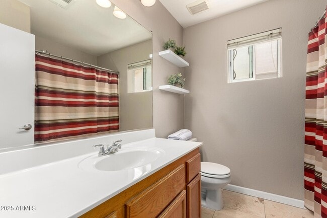 Building Photo - 8375 W Dahlia Dr