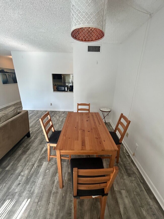 Building Photo - Now Leasing: 1-bedroom and 1.5 bath condo ...
