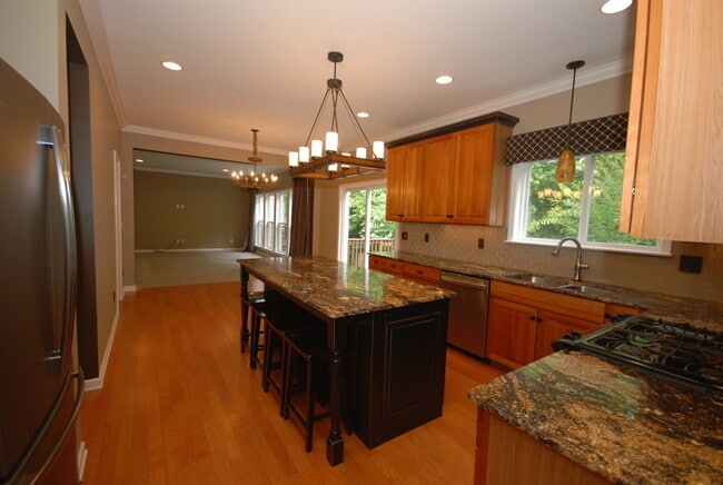 Building Photo - Oversized Executive Style Home with Finish...
