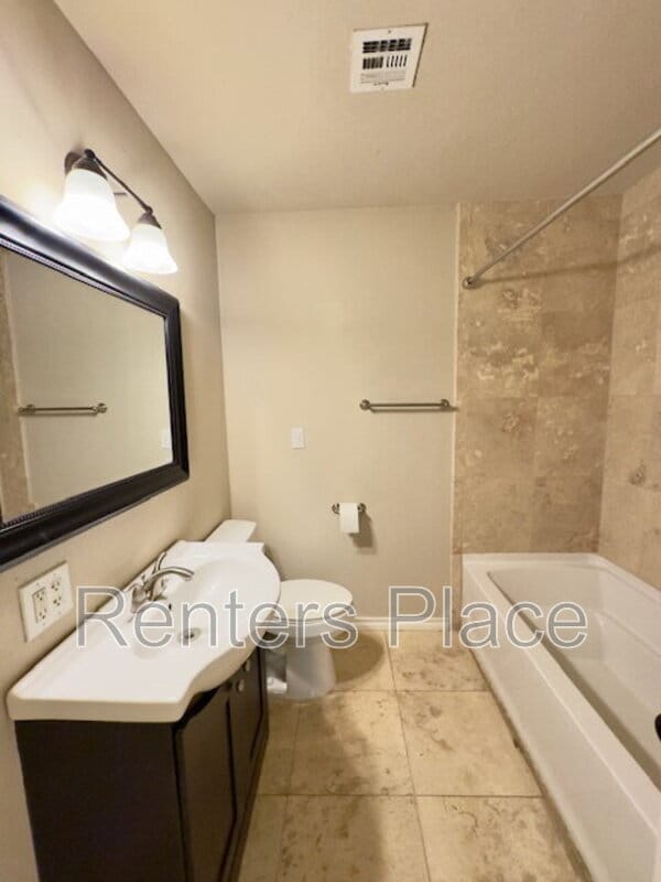 Building Photo - 4947 S Troost Ave