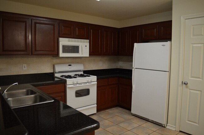 Building Photo - Available August 2026! 4 Bed/4 Bath Less t...