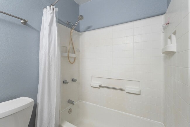 Building Photo - Discover this top-floor, two-bedroom, one-...