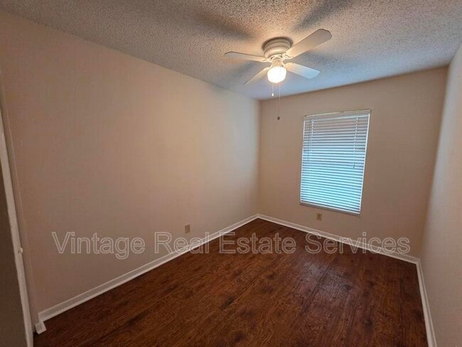 Building Photo - 5202 Sunridge Palms Dr