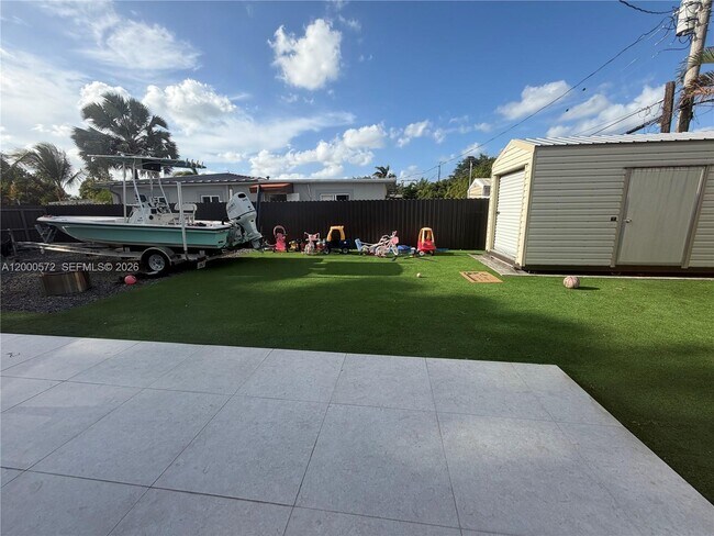 Building Photo - 6497 W 8th Ln