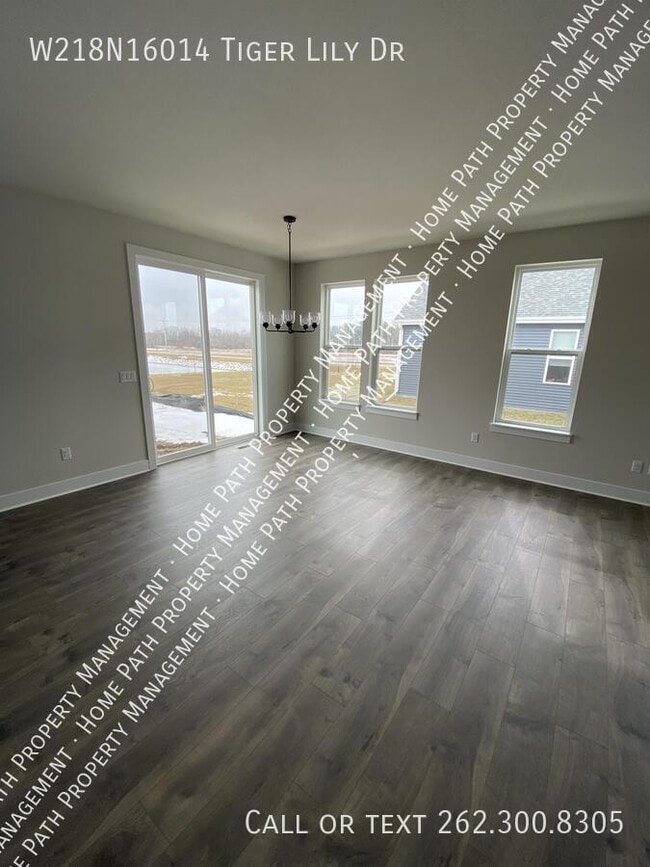 Building Photo - W218N16014 Tiger Lily Dr