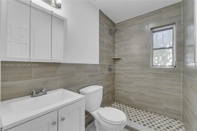 Building Photo - 6940 NW 6th Ct