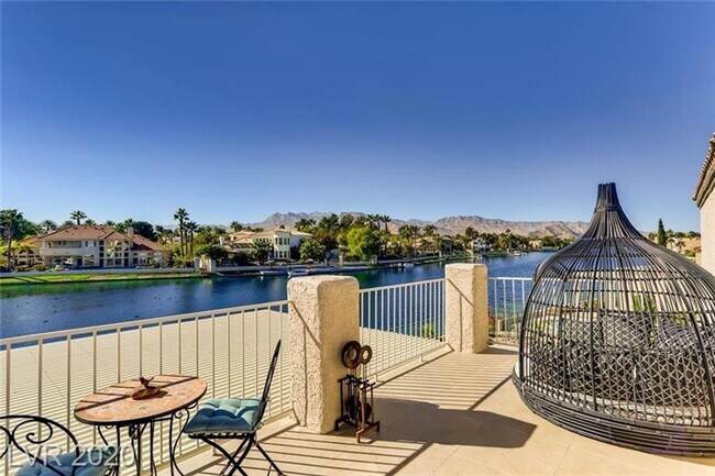 Building Photo - Vegas's Only Available Waterfront Rental ~ 4 Bedroom Desert Shores Lake Front Home