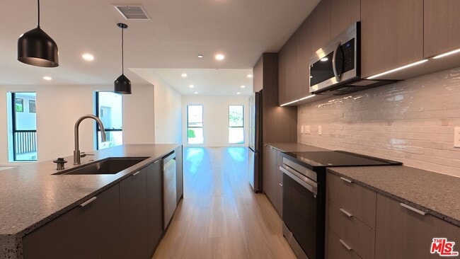 Building Photo - 5119 Colfax Ave