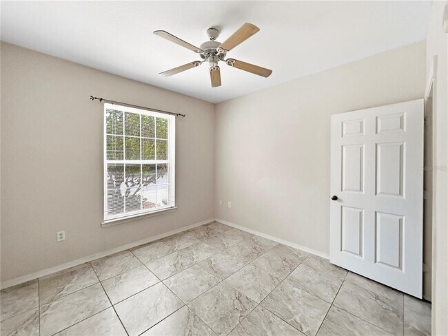 Building Photo - 10205 Courtney Palms Blvd