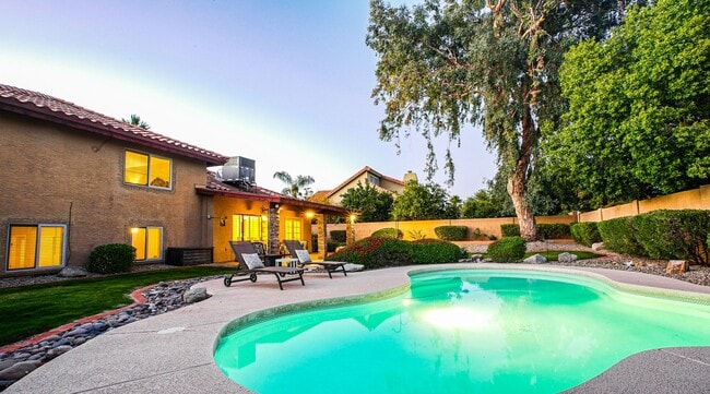 Building Photo - Heated Pool Home/Split Level Magic Zip Code