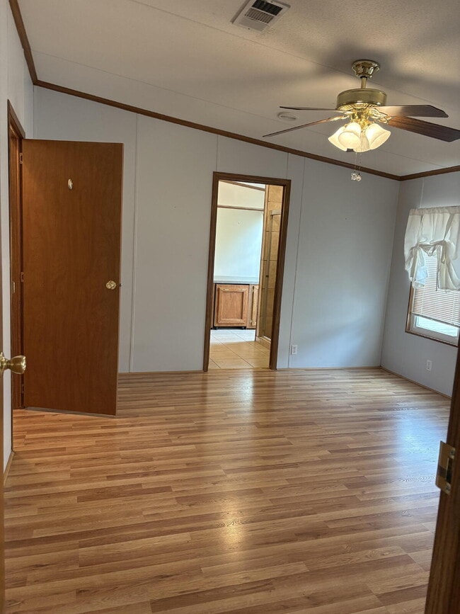 Building Photo - charming 3-bed, 2-bath home is located in the highly desired Strawberry Crest 55+ community