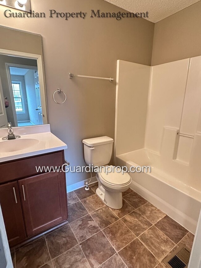 Building Photo - North Brooklyn Park Town Homes, Dedicated Office, 2 Car Garage, Washer/Dryer, Front Patio