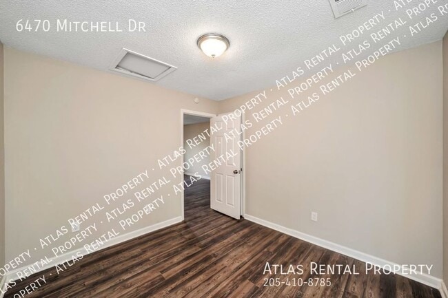 Building Photo - 6470 Mitchell Dr