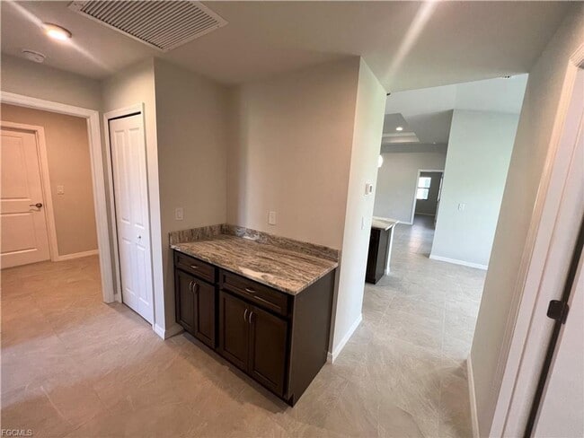 Building Photo - Stunning 4 Bed 3 Car Garage Home Available Now Near Burnt Store Rd