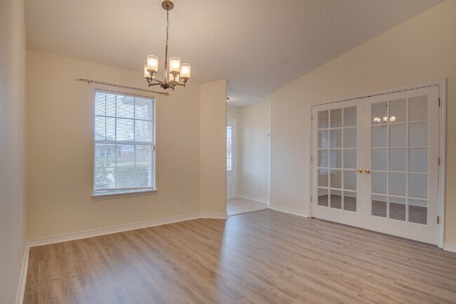 Building Photo - Updated 4BR/3BA Brick Home Near NAS Pensacola with Office & Screened Porch