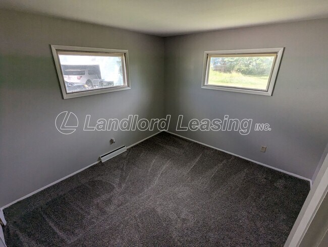 Building Photo - Charming Updated Ranch with Fenced Yard in...