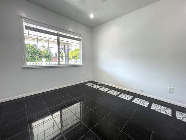 Building Photo - 8824 Tyrone Ave