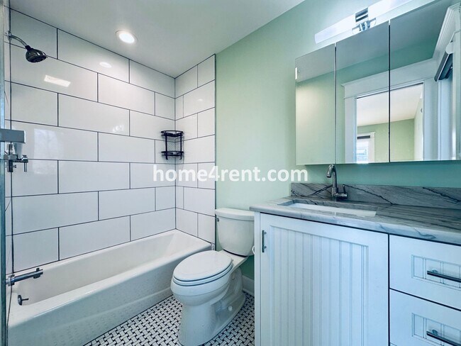 Building Photo - Charming Home Near Country Club Plaza w/ Gorgeous Updates, Wood Floors and a Two Car Garage!