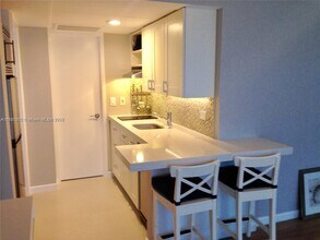 Building Photo - 9920 Collins Ave