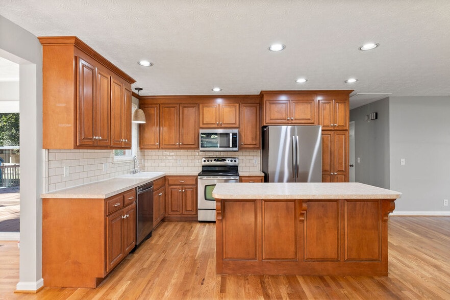 Kitchen features brand new refrigerator, microwave and dishwasher. - 8171 Horton Hwy